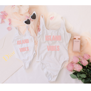 Mom and daughter matching swimsuits Island vacay